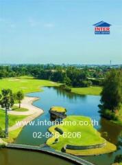 Landscape view of a golf course with water bodies and greenery