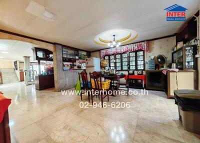Spacious kitchen with dining area and ample storage