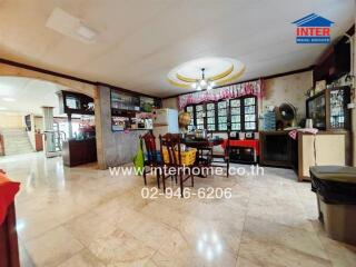 Spacious kitchen with dining area and ample storage