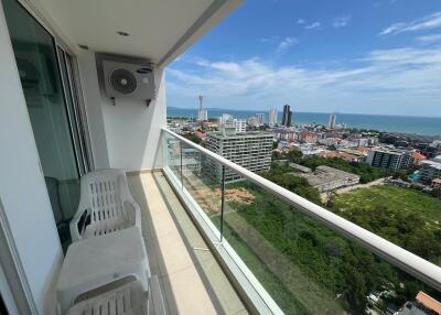 High-rise balcony with city and ocean view