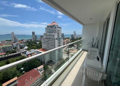 High-rise apartment balcony with city and ocean view