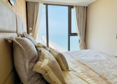 Bedroom with a view of the beach