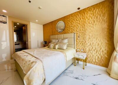 Luxurious bedroom with golden accents and modern decor