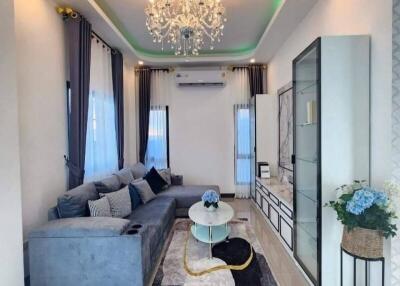 Modern living room with chandelier