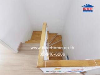 Wooden staircase with handrail