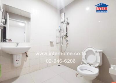 Well-maintained bathroom with shower and toilet