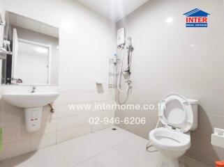 Well-maintained bathroom with shower and toilet