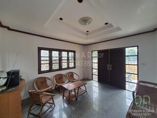 Open and spacious living room with elegant ceiling design