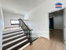 Modern house interior with staircase and wooden flooring