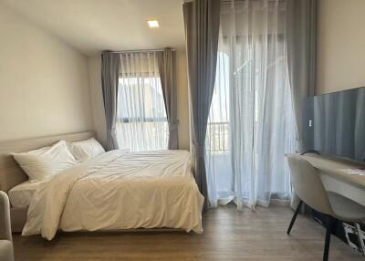 Bedroom with large windows and natural light