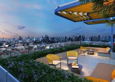 Modern rooftop terrace with city skyline view