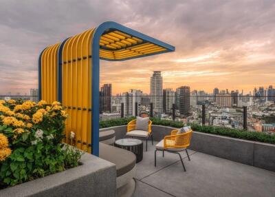 Rooftop terrace with seating area and city views