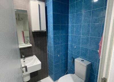 Modern bathroom with blue tiles