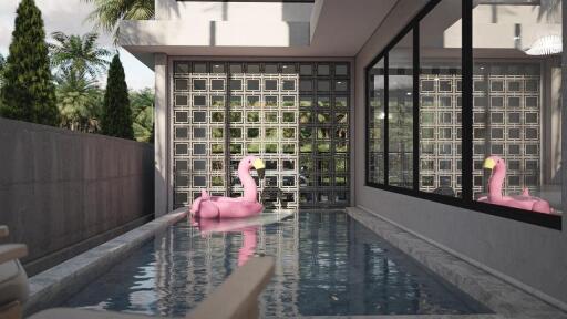 Outdoor swimming pool with a pink flamingo float