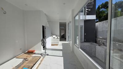 spacious living area with large windows