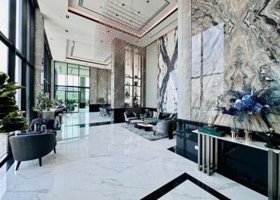 Elegant modern lobby with high ceilings and luxurious decorations