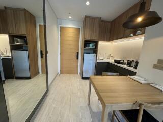 Modern kitchen with wooden cabinets and dining table