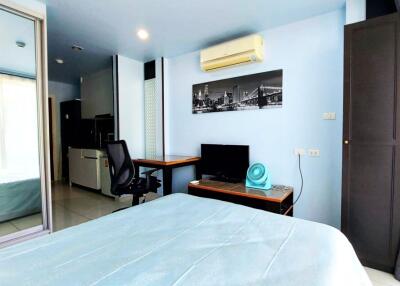Fully furnished studio room with garden view