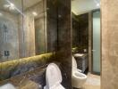 Luxurious bathroom with modern amenities and marble finishes