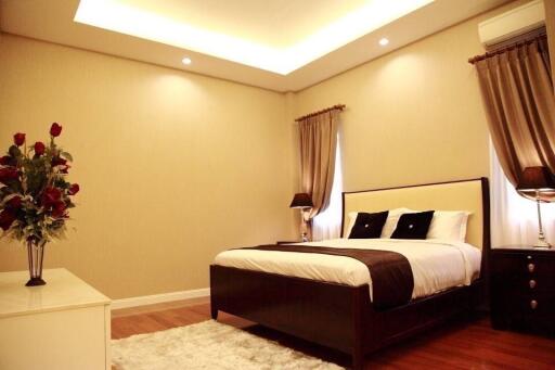 Spacious and elegantly decorated bedroom with modern furnishings