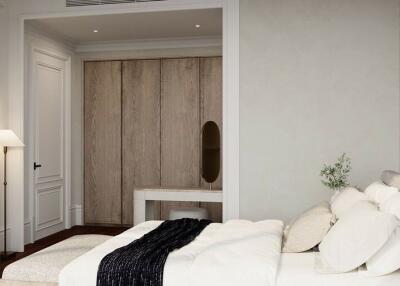 A modern bedroom with a neutral color scheme, featuring a bed, wall-mounted TV, and wooden closet