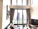 Spacious living room with floor-to-ceiling windows and city view