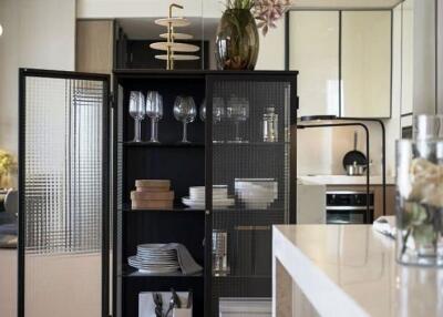 Modern kitchen with open shelves and dining area