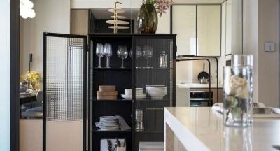 Modern kitchen with open shelves and dining area