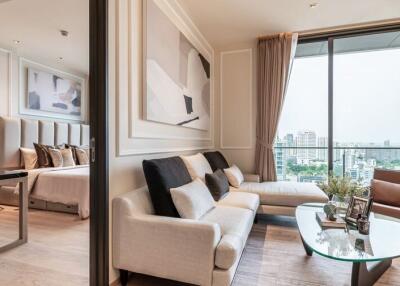 Modern living room with floor-to-ceiling windows and adjoining bedroom