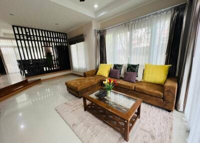 Spacious living room with sectional sofa and coffee table