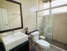 Modern bathroom with large mirror and glass shower