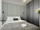 Modern minimalist bedroom with neutral colors and built-in wardrobes