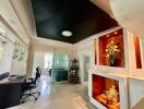 Modern and stylish living area with black ceiling and decorative display
