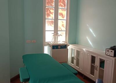 Medical examination room with medical equipment