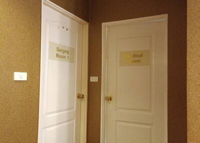 Hallway with doors to Surgery Room 1 and Medical Room