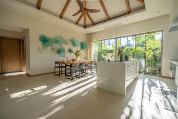 Spacious open-plan kitchen and dining area with modern decor