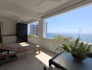 Balcony with ocean view and lounge chair