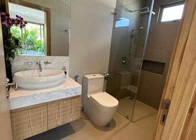 Modern bathroom with shower and vanity