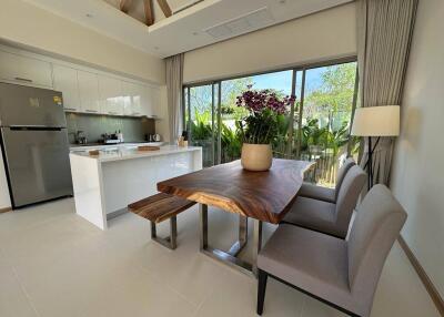 Modern kitchen dining area with natural light