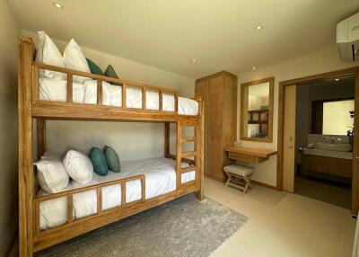 Bedroom with bunk beds and desk