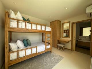 Bedroom with bunk beds and desk