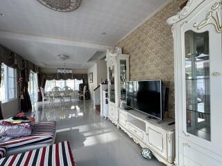 Spacious and elegant living room with natural lighting