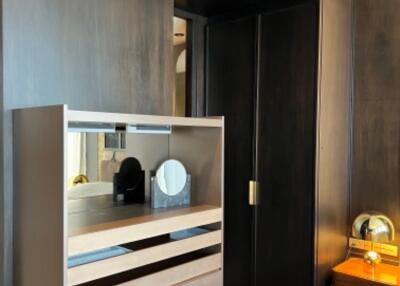 Bedroom with modern wooden closet and dresser