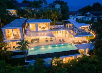 Luxurious multi-story mansion with infinity pool and spacious terraces
