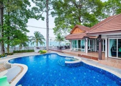 Beautiful outdoor area with swimming pool and adjacent house