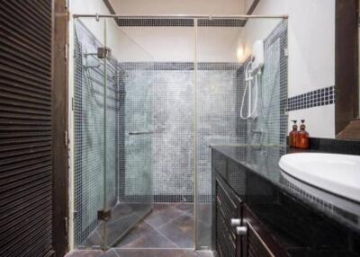 Modern bathroom with glass shower enclosure