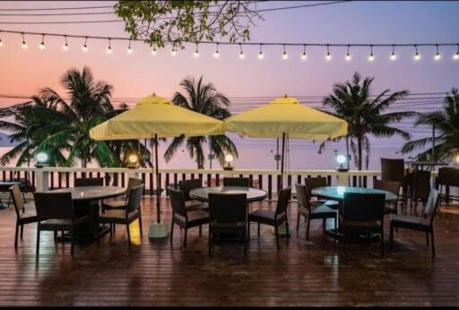 Outdoor patio with seating and string lights