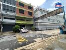 Street view of buildings and a parking area