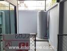 Outdoor area with water tank and covered space