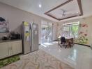 Modern kitchen with natural lighting and dining area